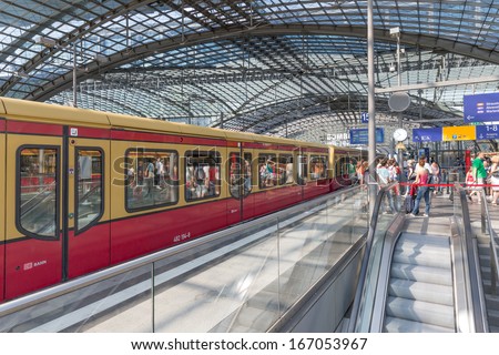 Berlin, Germany - July 25: Unknown Commuters Are Traveling By Train At The Central Station Of Berlin On July 25, 2013 In The Central Station Of Berlin, Germany
