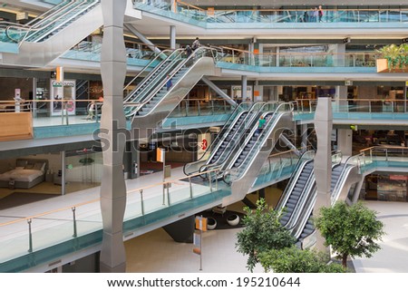 AMSTERDAM, THE NETHERLANDS - MAY 23: People shopping in the Dutch indoor shopping mall Villa Arena on May 23, 2014 in Amsterdam, the Netherlands