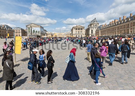 VERSAILLES PARIS, FRANCE - MAY 30: Long waiting queues of visitors on May 30, 2015 at the entrance of Palace of Versailles near Paris, France
