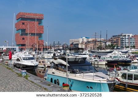 ANTWERP, BELGIUM - AUG 13: Marina harbor with yachts and sail boats near museum MAS on August 13, 2015 in the harbor of Antwerp, Belgium