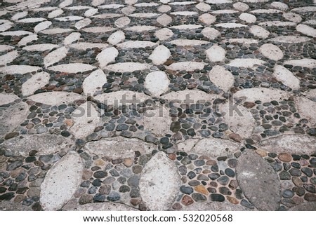 Stone floor of an outdoor courtyard with interesting pattern