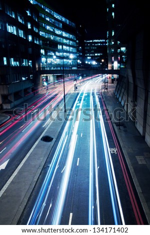 Cars lights on London street by night