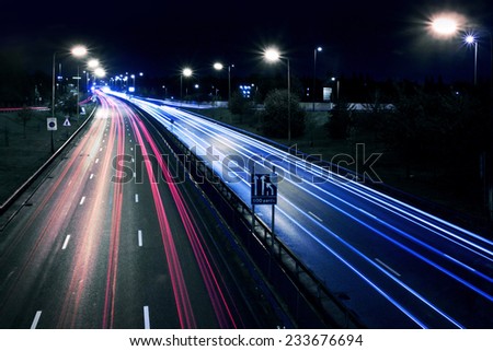 Cars lights on London street by night