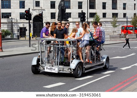 LONDON, 8 AUG 2015. Editorial Photo of Pedibus on Blackfriars Bridge, London. Pedibus human powered city tours are popular for corporate events and stag and hen days (bachelor nights) etc