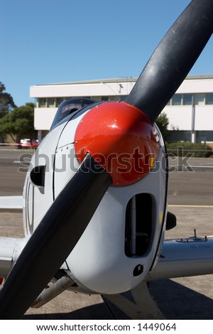 Airplane propeller with red center cone