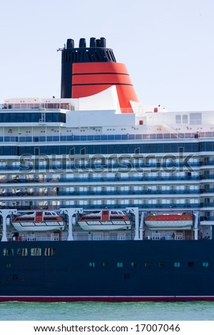 A cruise ship showing decks and funnel