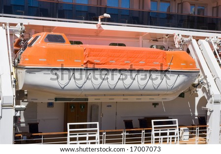A life boat on a large ship