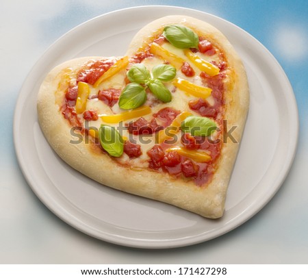 Pizza In The Form Of Heart On The Dish