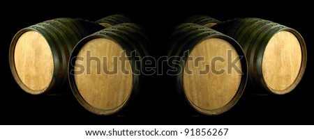 Barrels of wine on black background