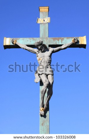 Statue of Jesus on the oldest stone bridge in central Europe - Pisek