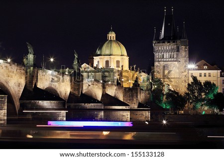 The night View on bright Prague Old Town with the Charles Bridge and its Bridge Tower, Czech Republic