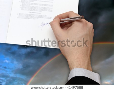 Signature of Business Contract on the blue Sky with the Rainbow
