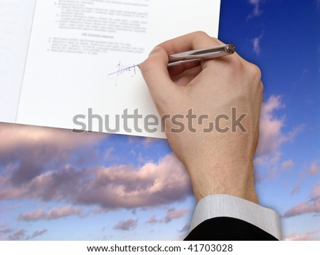 Signature of Business Contract on the dramatically Sky
