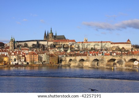 Colorful Prague gothic Castle on the River Vltava with Charles Bridge