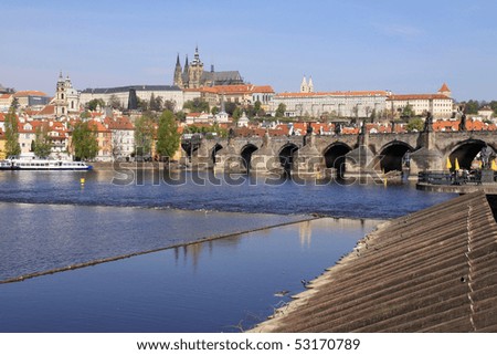 The View on the spring Prague's gothic Castle with the Charles Bridge