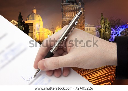 The Signature of Business Contract in front of night Prague