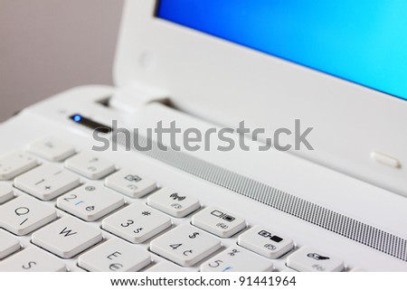 The detail of the white Key Board Laptop Computer