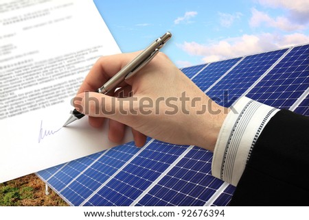 The Signature of Business Contract in front of the Solar Power Station