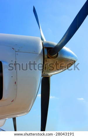 Aircraft propeller against a blue sky