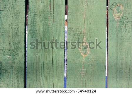 Smooth fence pine boards painted green