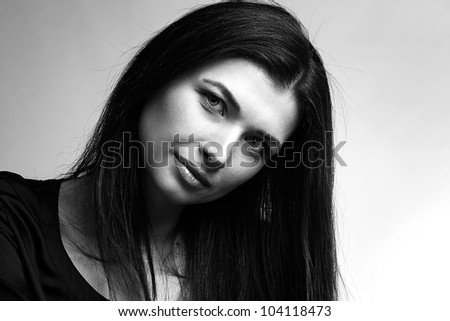 Black and white of luxury woman in black dress on natural background/. Fashion photo