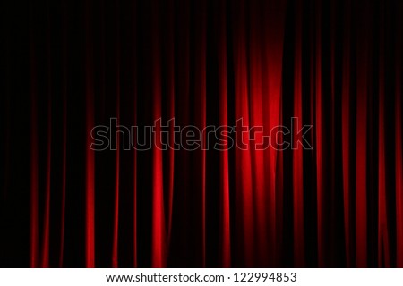 Part of a red curtain.