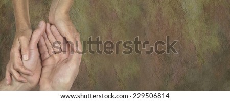 Charity Parchment web banner - Male and female hands in gentle embrace on parchment banner background