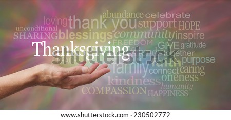 Thanksgiving Day Blessings - Female hand outstretched with palm side up and a white \'Thanksgiving\' word floating above surrounded by words related to Thanksgiving theme on a multicolored background