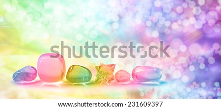 Cosmic Healing Crystals Website Banner - Healer\'s crystals on a rainbow bokeh glittery background