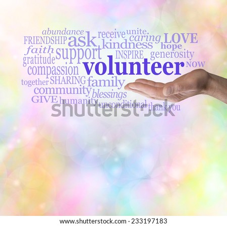 Please volunteer bokeh background  -  Male hand palm up with the word \'volunteer\' floating above surrounded by relevant words on a rainbow colored bokeh background