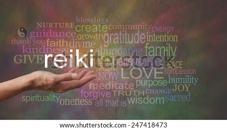 Reiki in the palm of your hand     Female hand outstretched with the word REIKI floating above, surrounded by healing related words on a wide multicolored stone effect background