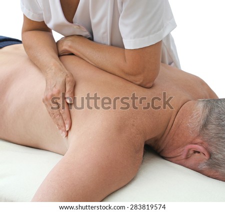 Therapist applying pressure with forearm  -  Female sports massage therapist applying pressure to male prone client using forearm and body weight