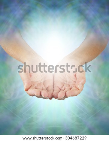 Sharing Divine Healing Energy - Female healing hands emerging from an intricate blue-green energy background cupped offering misty white energy