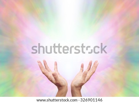 Angelic Energy Healer - Female energy worker with hands outstretched and open upwards sensing healing energy on ethereal rainbow colored  energy formation background