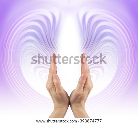 Eternal Energy Streaming - Healing hands pointing upwards with a lilac energy formation streaming up and around the hands and a central white energy center with plenty of copy space
