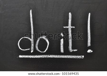 handwritten motivation words - Do it! on the school blackboard