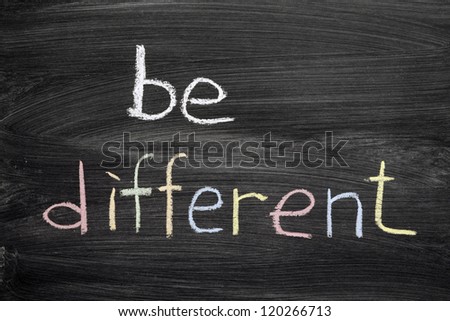 be different phrase handwritten on school blackboard
