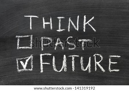 think future not past concept handwritten on the school blackboard