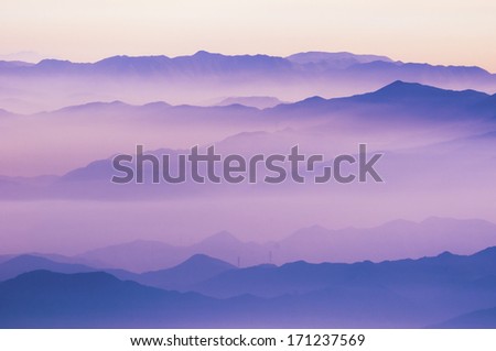 scenic Japanese mountain ridges in purple haze