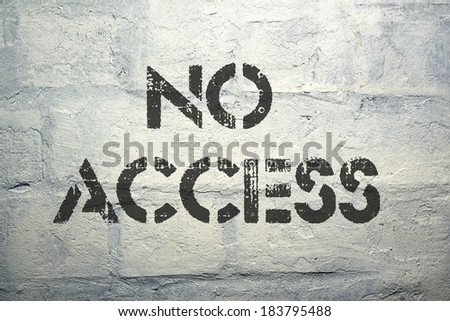 no access exclamation stencil print on the grunge white brick wall