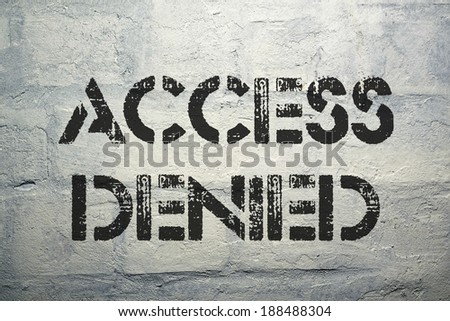 access denied black stencil print on the grunge brick wall
