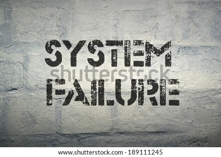 system failure black stencil print on the grunge brick wall with gradient effect