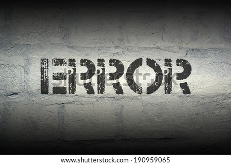 error stencil print on the grunge white brick wall