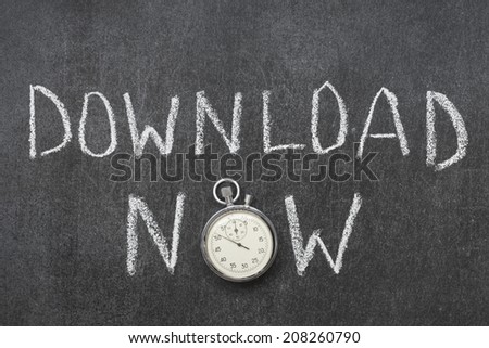 download now concept handwritten on chalkboard with vintage precise stopwatch used instead of O