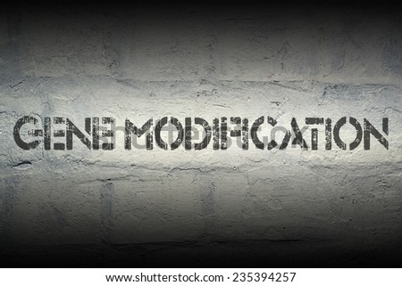 gene modification stencil print on the grunge white brick wall