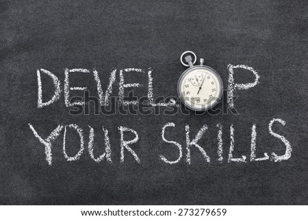 develop your skills phrase handwritten on chalkboard with vintage precise stopwatch used instead of O