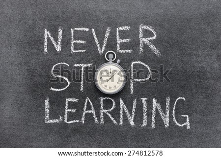 never stop learning phrase handwritten on chalkboard with vintage precise stopwatch used instead of O