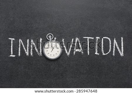 innovation word handwritten on chalkboard with vintage precise stopwatch used instead of O