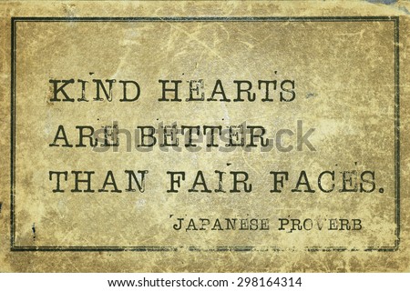 Kind hearts are better than fair faces - ancient Japanese proverb printed on grunge vintage cardboard