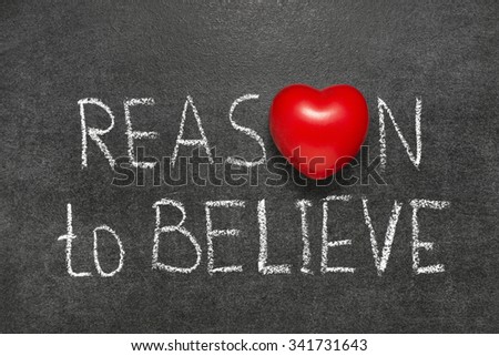 reason to believe phrase handwritten on blackboard with heart symbol instead O